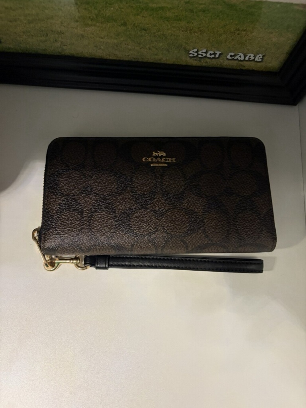 Coach Brown Signature Zip-Around Wristlet with Black Strap
